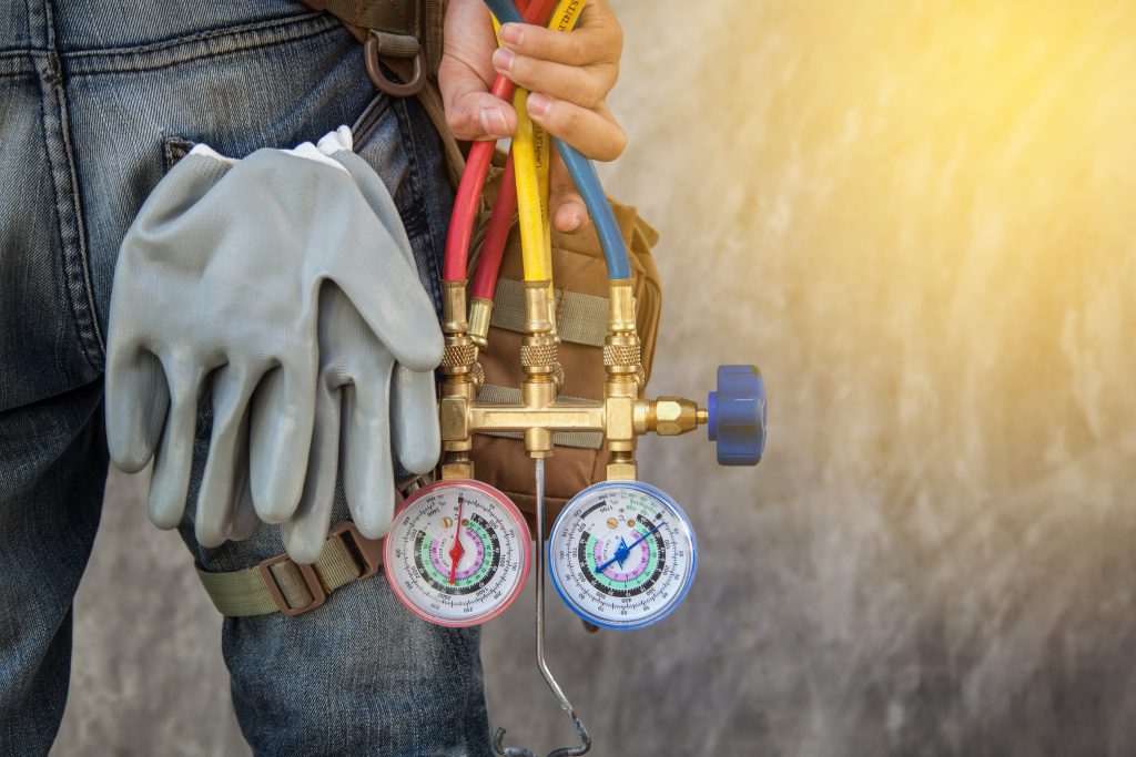 Air Conditioning Technician and A part of preparing to install new air conditioner.